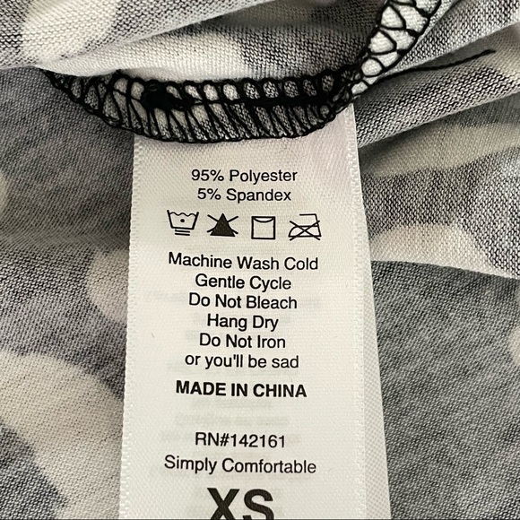 LuLaRoe New Black Leopard Cheetah Print Morgan Short Sleeve Tunic Blouse XS - Picture 4 of 10